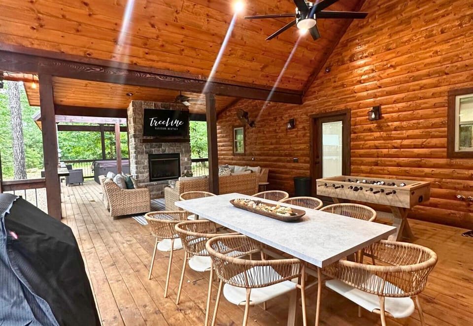 Outdoor dining at its finest, this spacious covered deck offers plenty of seating for group meals surrounded by nature.