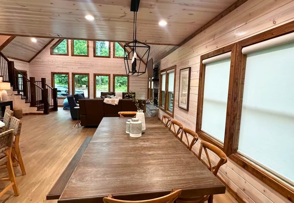 High ceilings, large windows, and an open floor plan create a living area that feels both spacious and inviting.