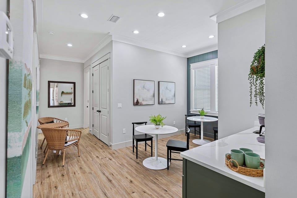 2nd Floor - Kitchenette with sink, fridge, and coffee station and lounge seating