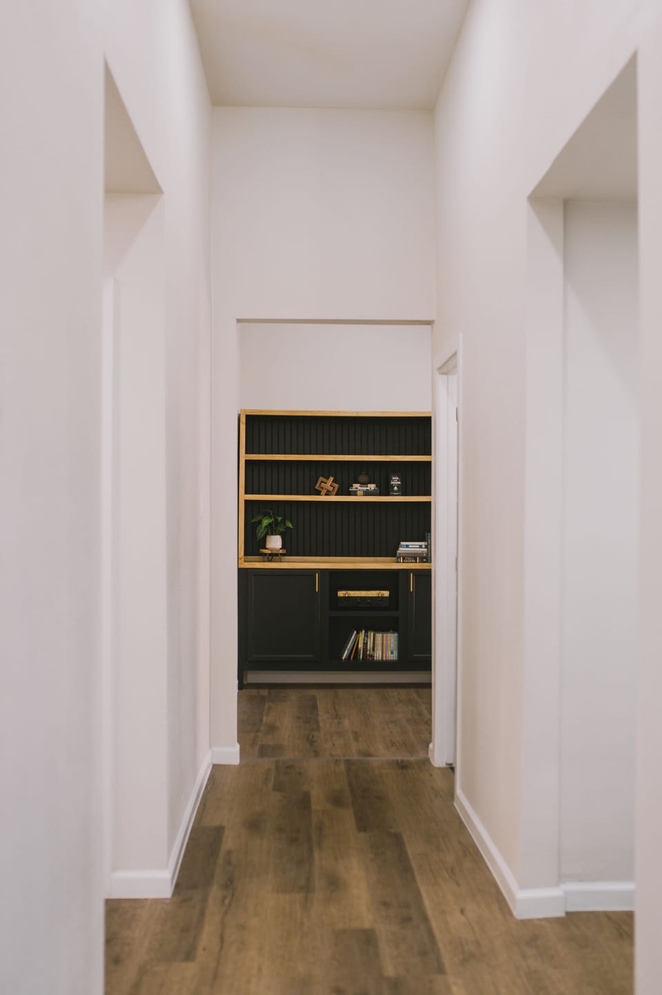 Thoughtful design in every space. Even the hallways reflect the modern aesthetic, leading you to beautifully appointed rooms and unique decor elements.