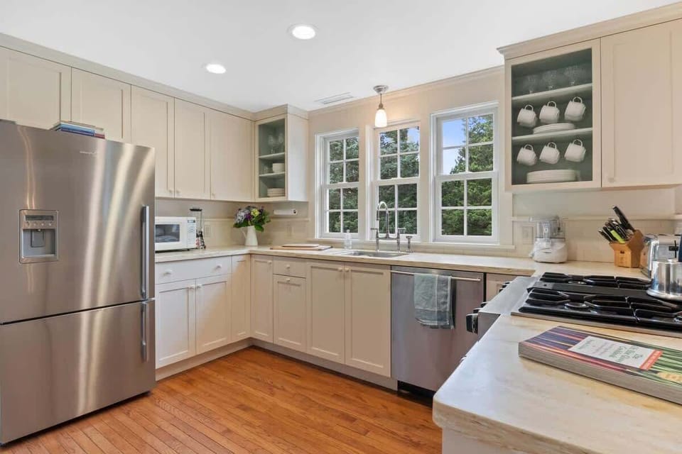 Fully updated kitchen featuring stainless steel appliances and ample counter space