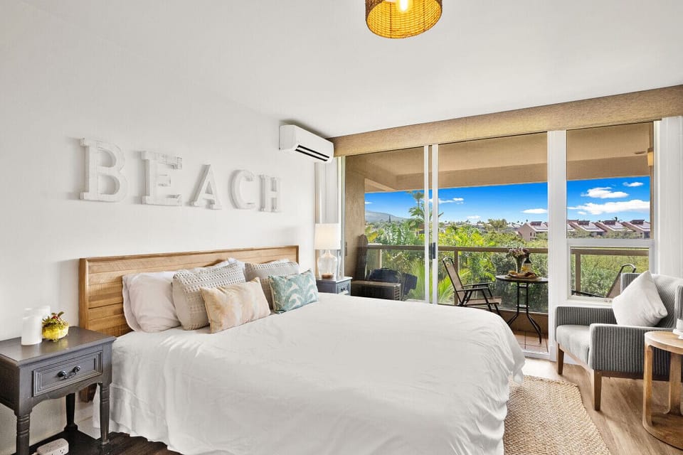 King-size bed with picturesque garden views