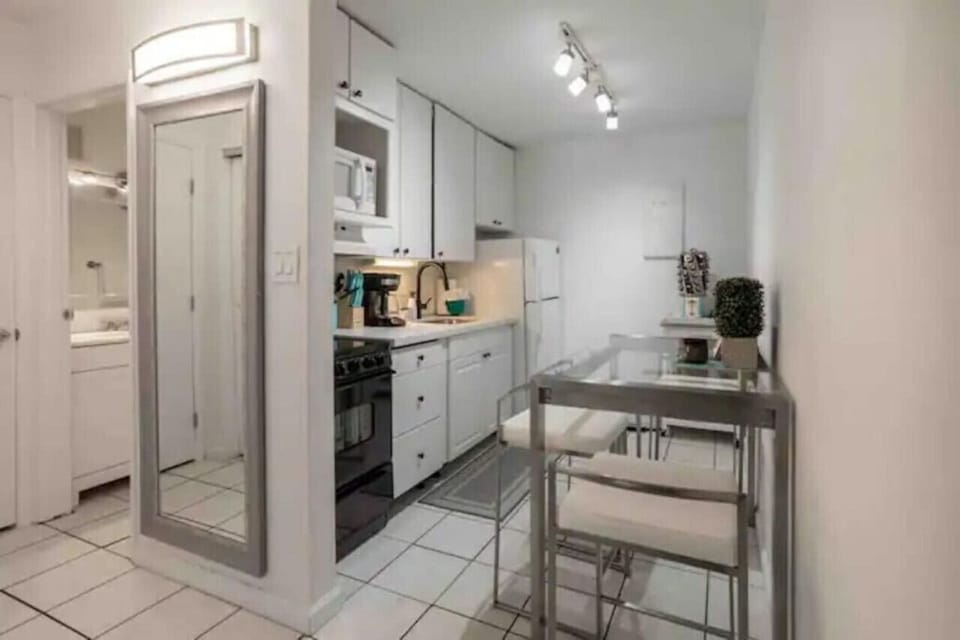Full kitchen with small dining table