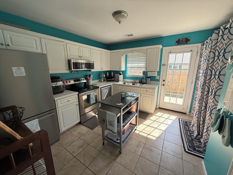 Kitchen with laundry room 
Keurig coffee station, air fryer provided 