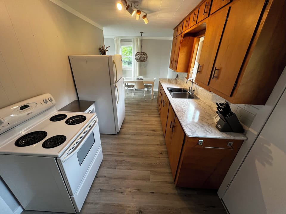 The galley kitchen and dining area.