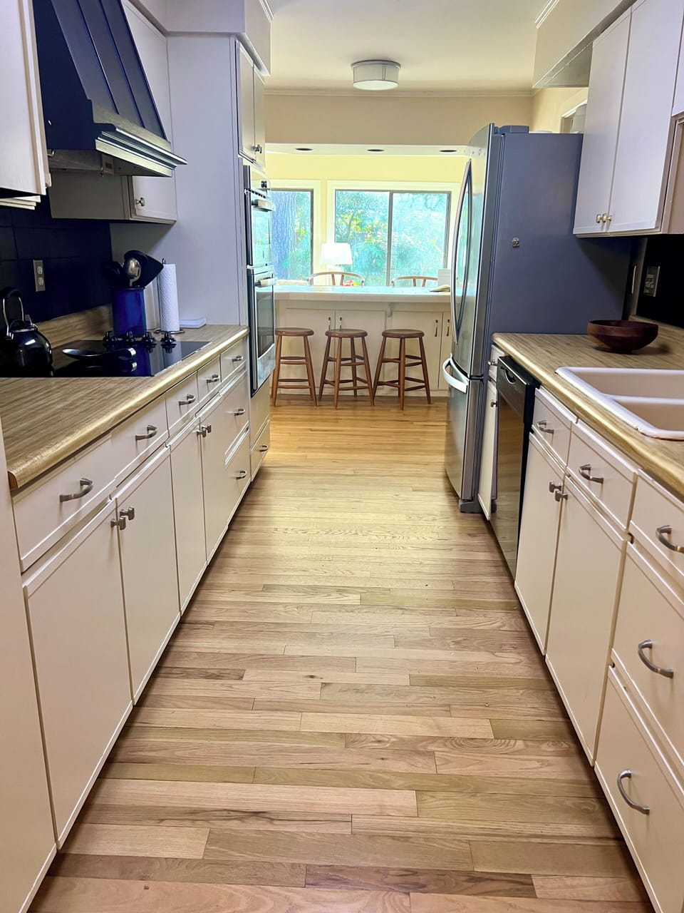 Kitchen with view of Sunroom in background