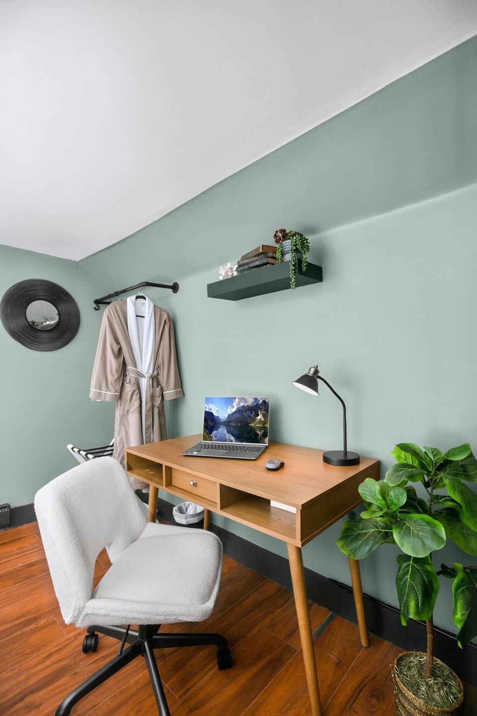 This bedroom features a dedicated workspace with printer.