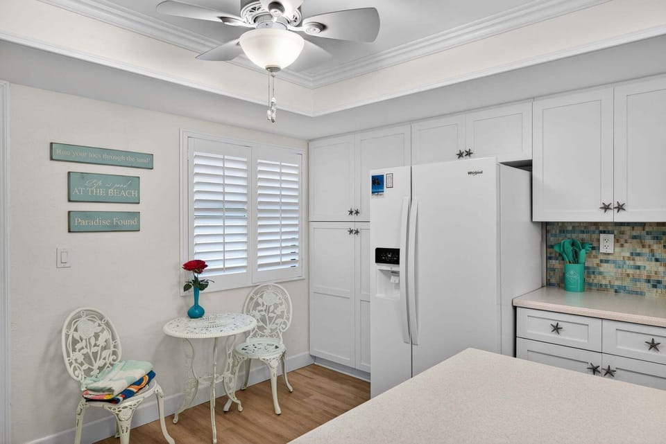 Kitchen with island and bar seating