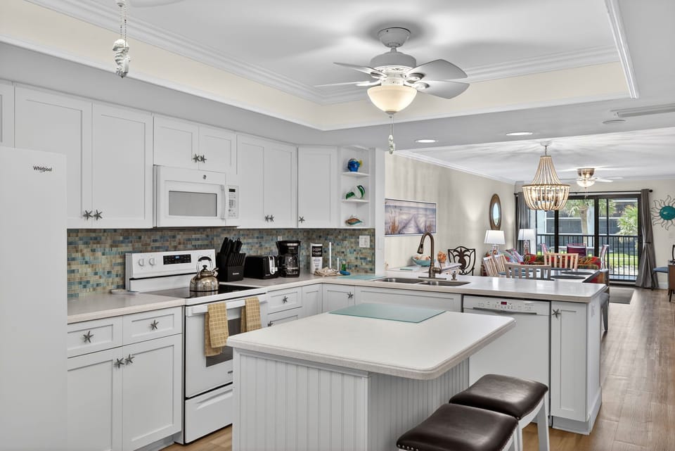 Kitchen with island and bar seating
