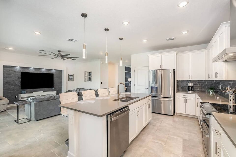 Full kitchen with fridge/freezer, range, vent, dishwasher