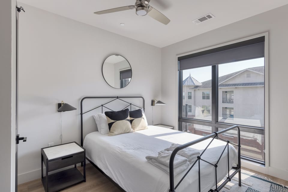 Bedroom 2, queen bed. (Muse)