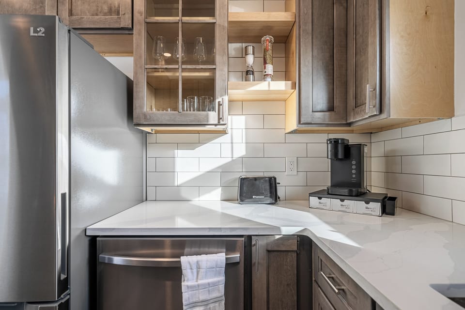 The kitchen is fully equipped and complete.