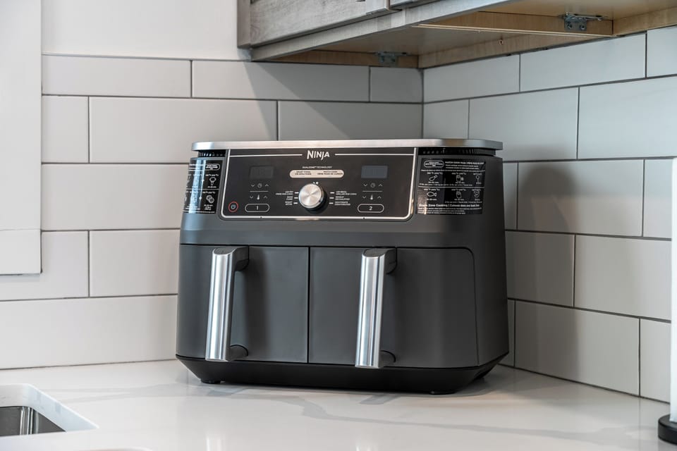 The kitchen is fully equipped and complete.