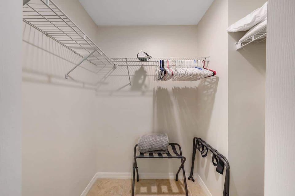 Enjoy the convenience of a spacious closet with plenty of room to organize your belongings. Featuring ample hanging space, shelving, and storage options, this closet is perfect for long stays or travelers who like to stay organized.