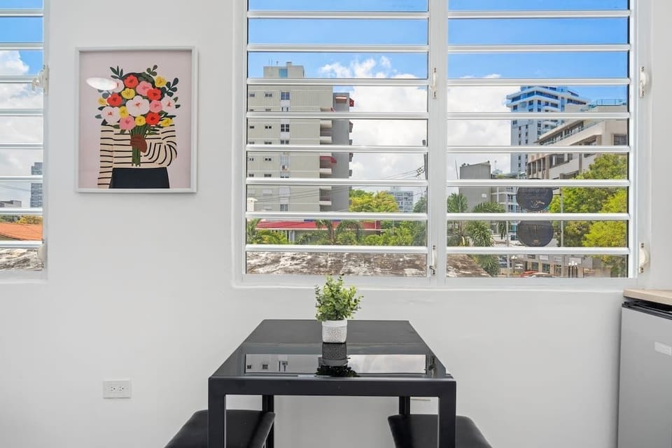 Savor your morning coffee in this cozy space, bathed in natural light, creating the perfect setting to start your day.