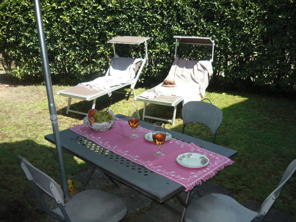 Furniture, Outdoor Furniture, Table, Chair, Outdoor Table, Garden, Backyard, Shade, Groundcover, Lawn