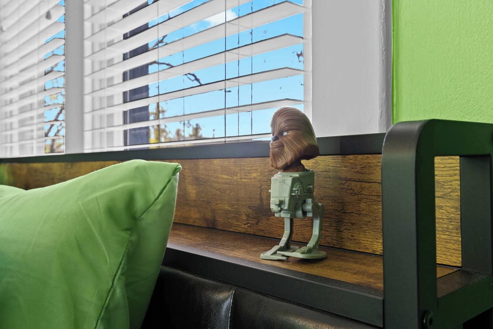 Bedroom 2: Drift off in this cozy, sunlit bedroom designed for restful nights.