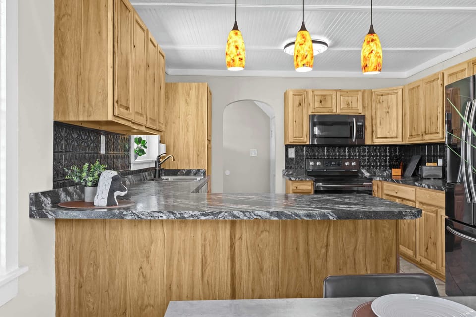 Kitchen: Ready for your morning coffee and more! Our spacious kitchen has everything you need.