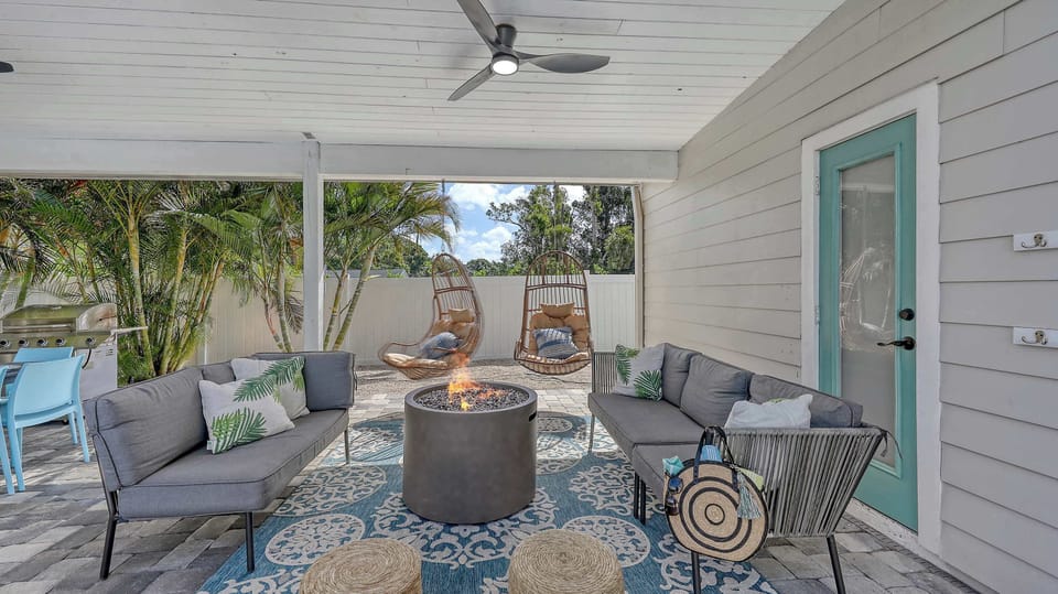 Start your morning with coffee in the hanging egg chairs or wind down fireside after a day in the sun—this space is all about connection and comfort. 
