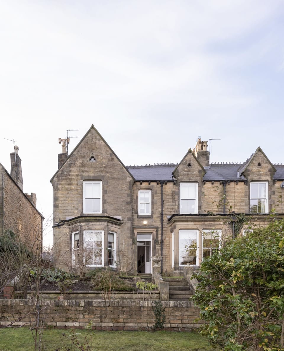 The Clarence - the exterior of the house viewed from the garden
