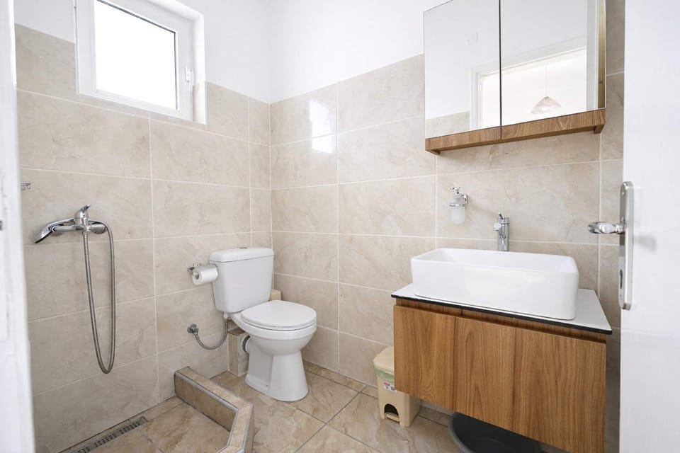 Bathroom with Shower – Functional Layout with WC and Sink