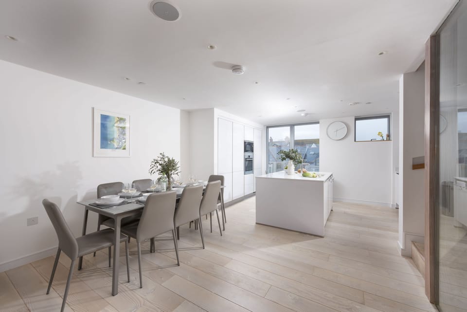 1 Island Reach, Newquay. Third floor: Retreat to the spacious third floor featuring kitchen, dining and sitting areas