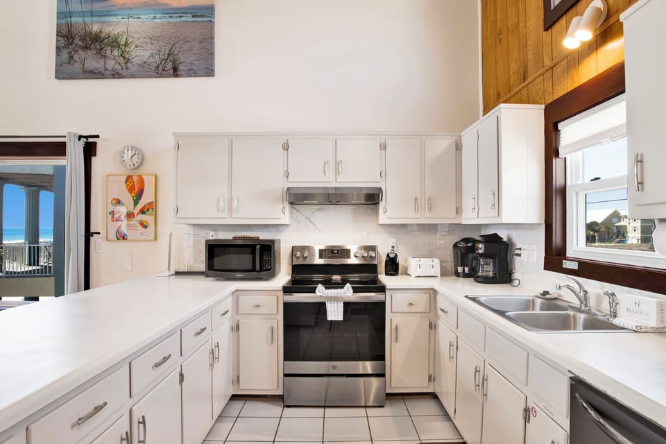 Updated stone counters with stainless steel appliances