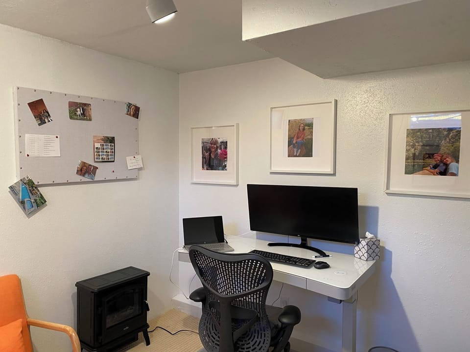 Standup desk, height adjustable, in kids room in the basement
