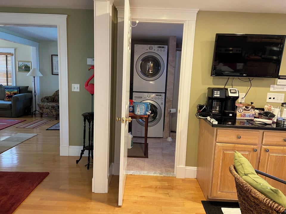 Another view of the washer and dryer room by the kitchen