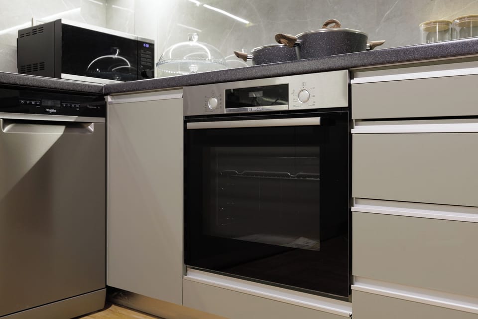 Brand new full kitchen with oven and dishwasher.