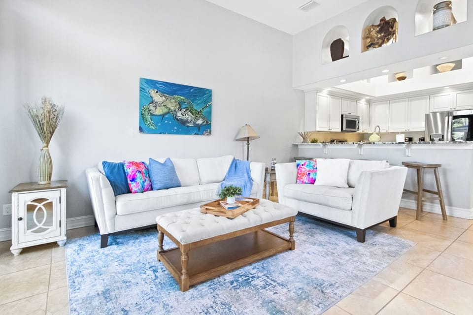 Gather in a bright & colorful living area with plush seating