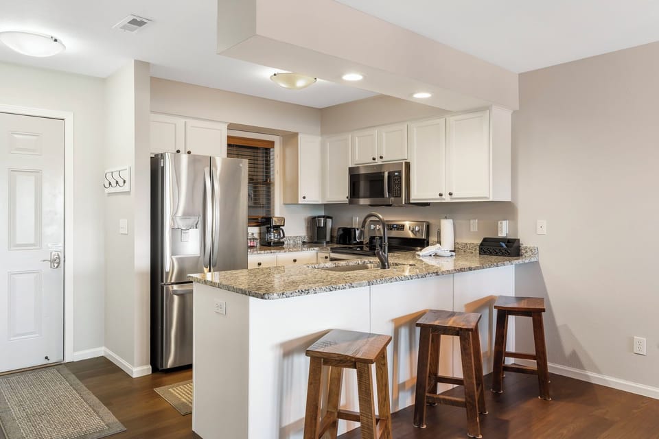 Full Kitchen with Extra Bar Seating