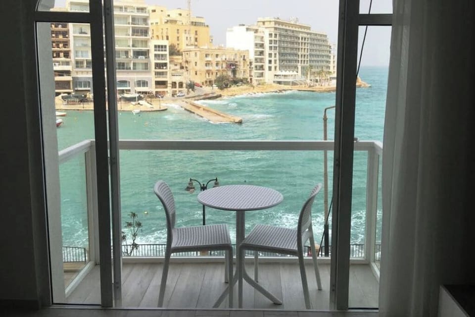 3 Kitchen / living / dining leading to sea-view balcony