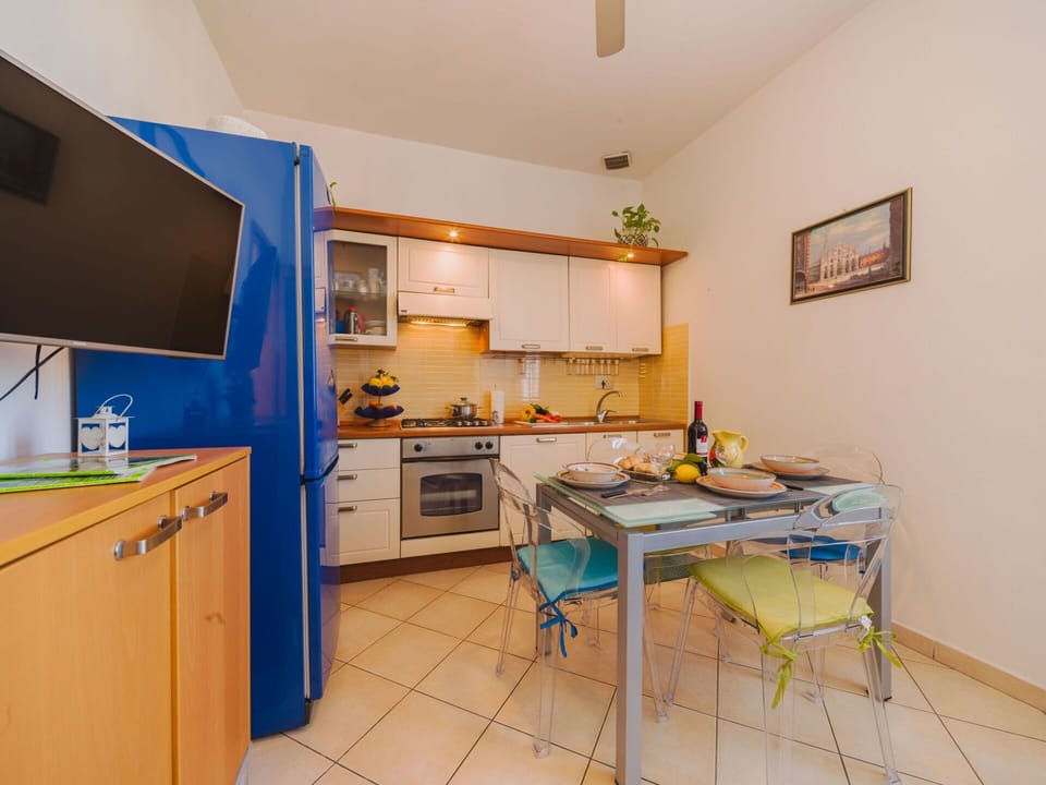 Blue, Chair, Outdoor Furniture, Design, Shade, Outdoor Table, Eco Hotel, Patio, Houseplant, Daylighting