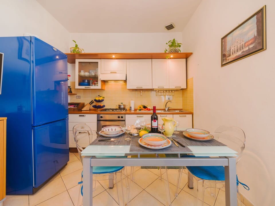 Blue, Chair, Outdoor Furniture, Design, Shade, Outdoor Table, Eco Hotel, Patio, Houseplant, Daylighting