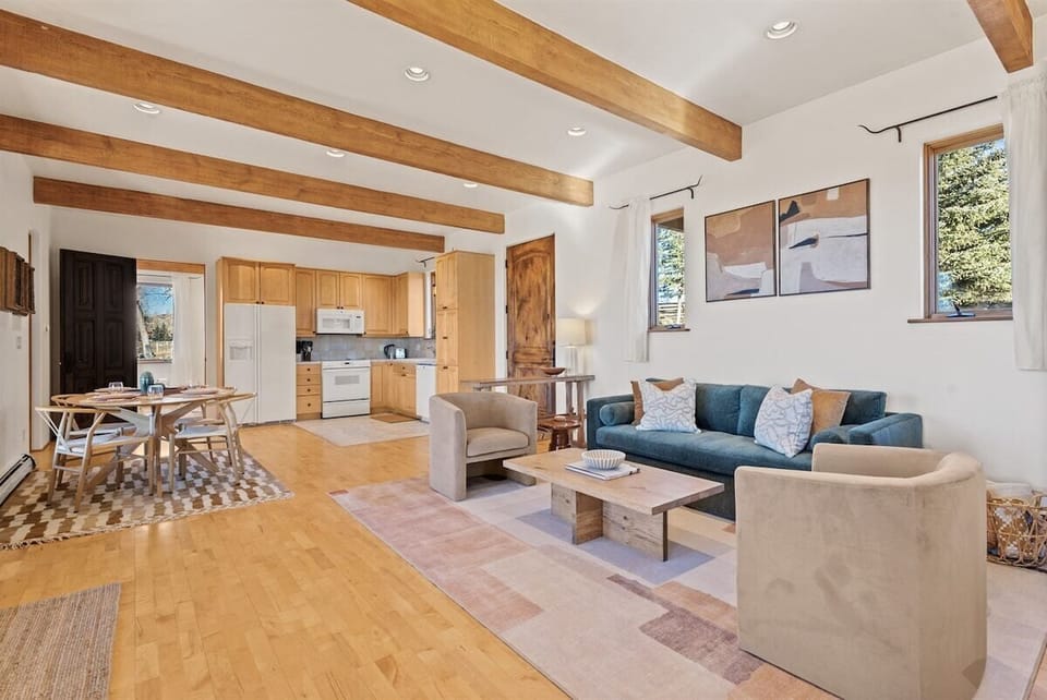 Professionally decorated La Casita with an open-concept style kitchen, dining, and living room (sofa is a queen pull out couch).