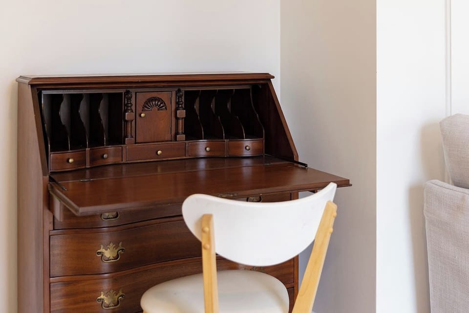 Stay productive or map out your coastal adventures at the study nook, featuring an antique-style desk and chair.