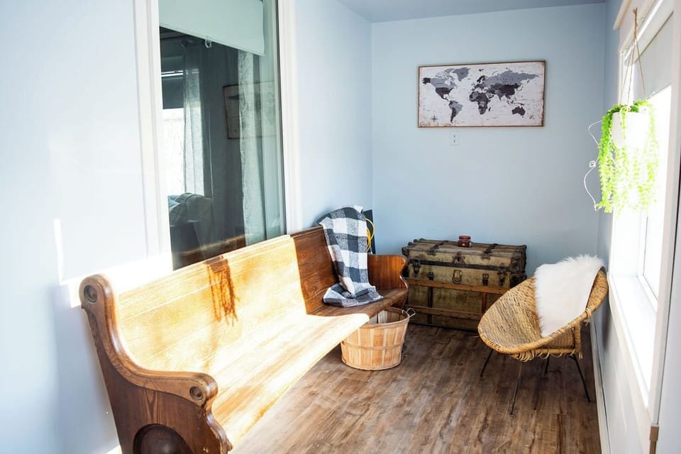 The perfect spot for morning coffee soak in the sun in this 3 season veranda