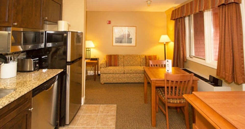 A well-appointed space for dining and lounging, ideal for quiet meals and cozy evenings.