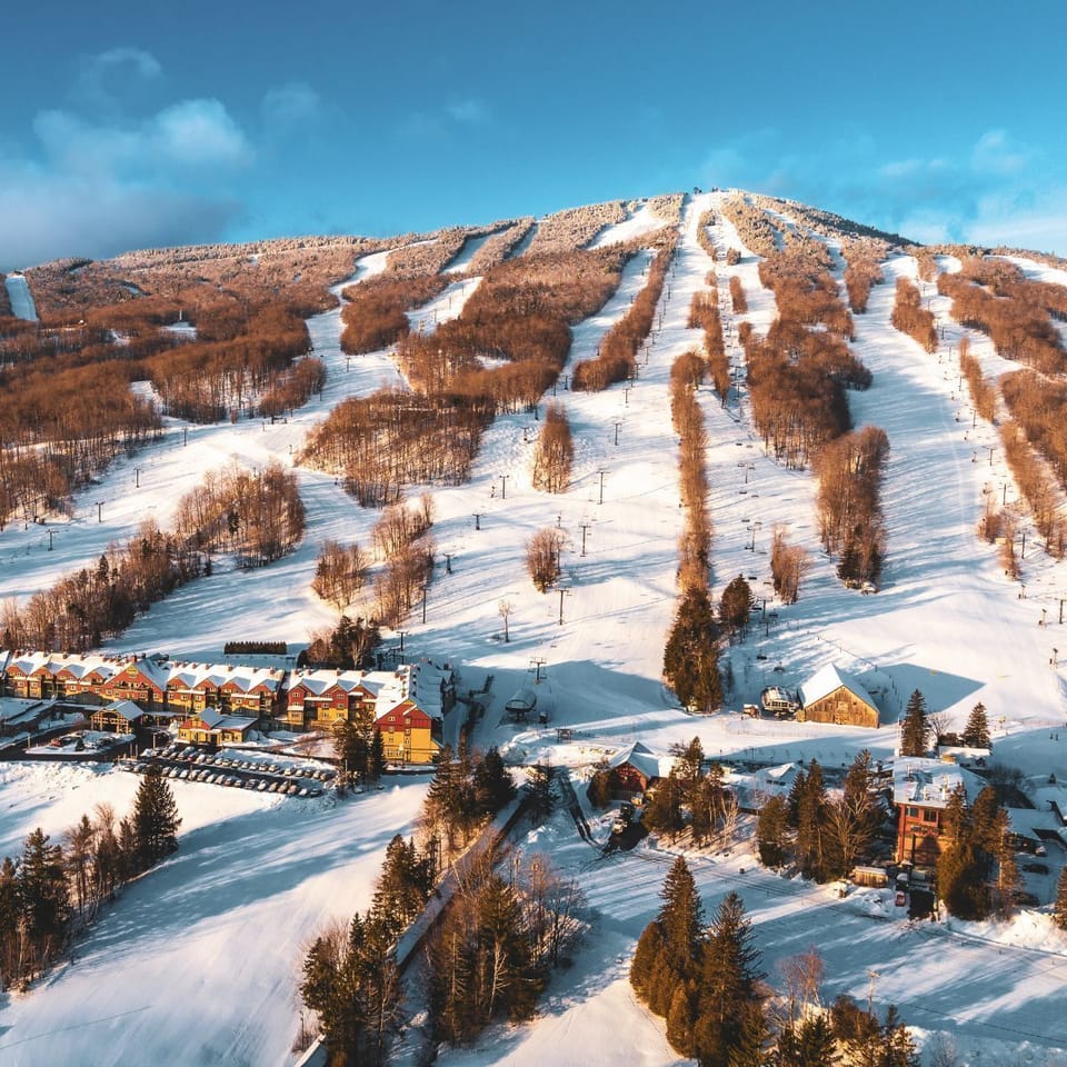 Nestled at the base of the mountain, this inviting resort offers seamless ski-in/ski-out access for an unforgettable winter getaway.