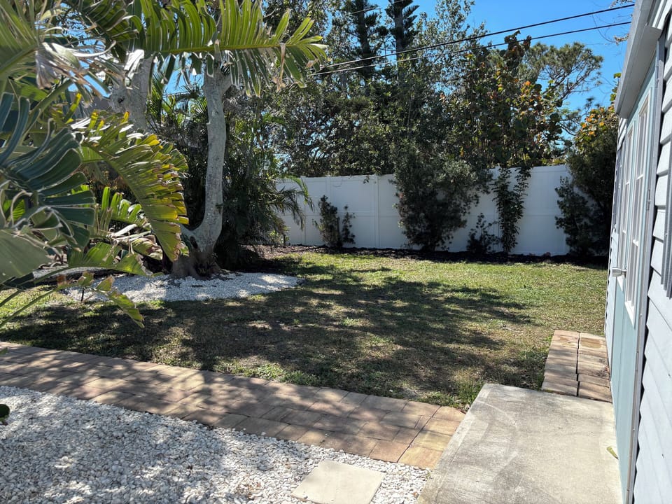 Backyard space for outdoor games. Very private space with 6' and 8' fencing.