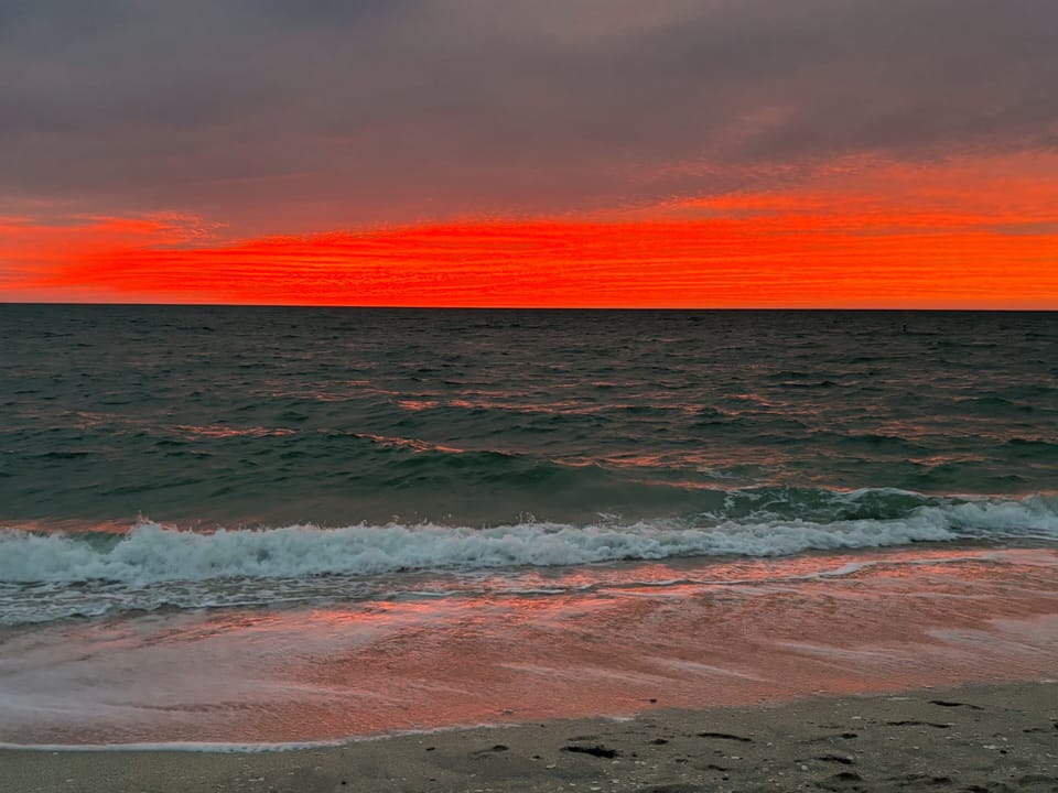 Dramatic sunset at Nokomis beach. An easy walk, bike or 1 minute by car!
