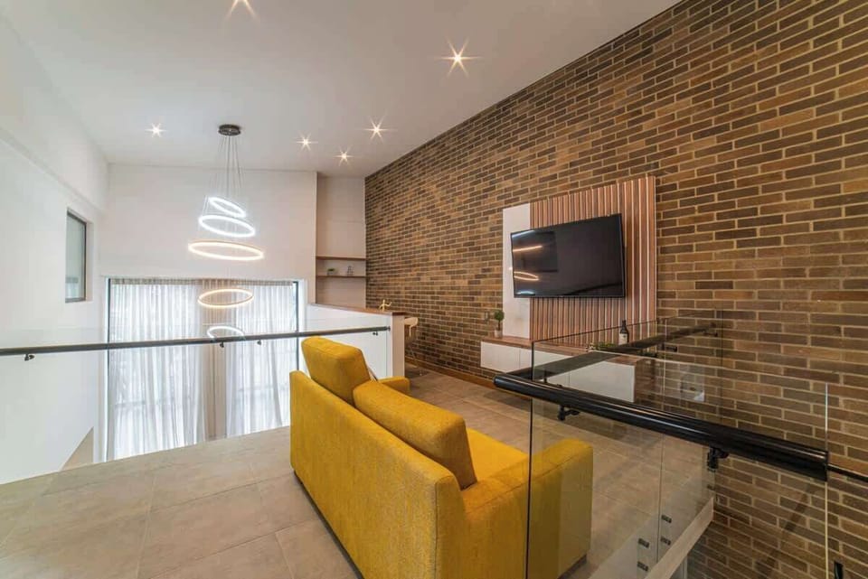 TV room with office space on second floor.