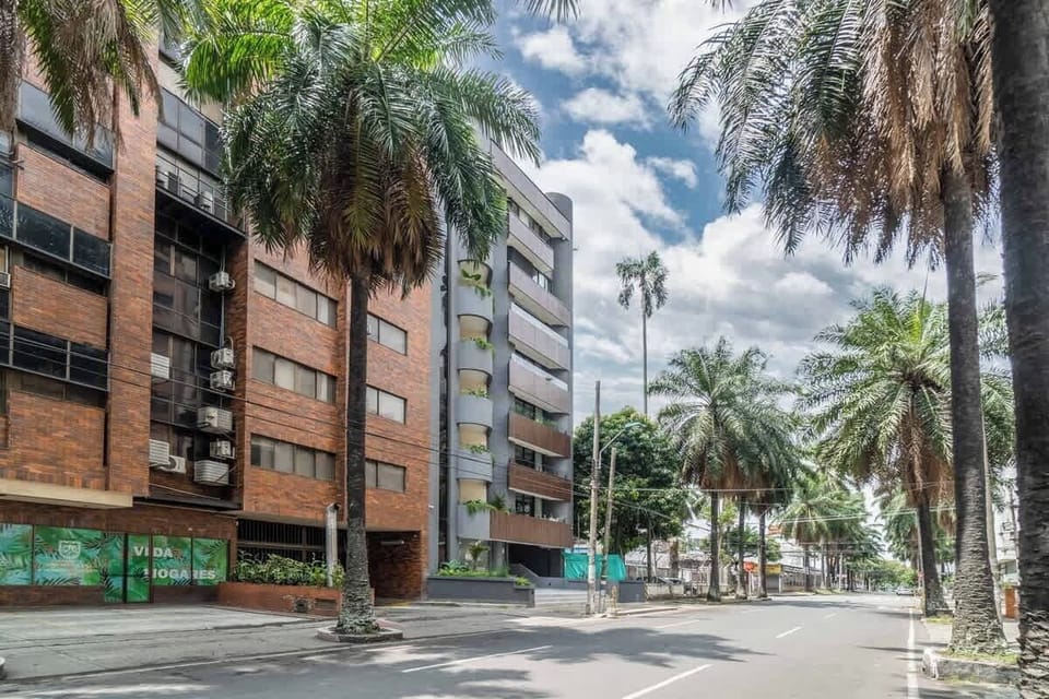 Beautiful palm lined streets. 
Hygge is the 8-story building with the grey and wood colored facade. 
