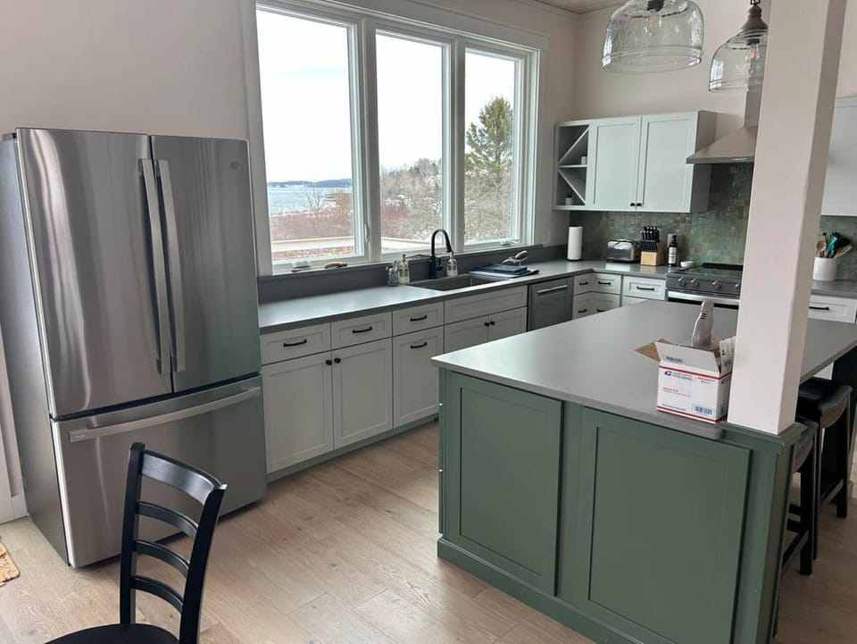 Kitchen.  Door to deck to the left of the fridge.