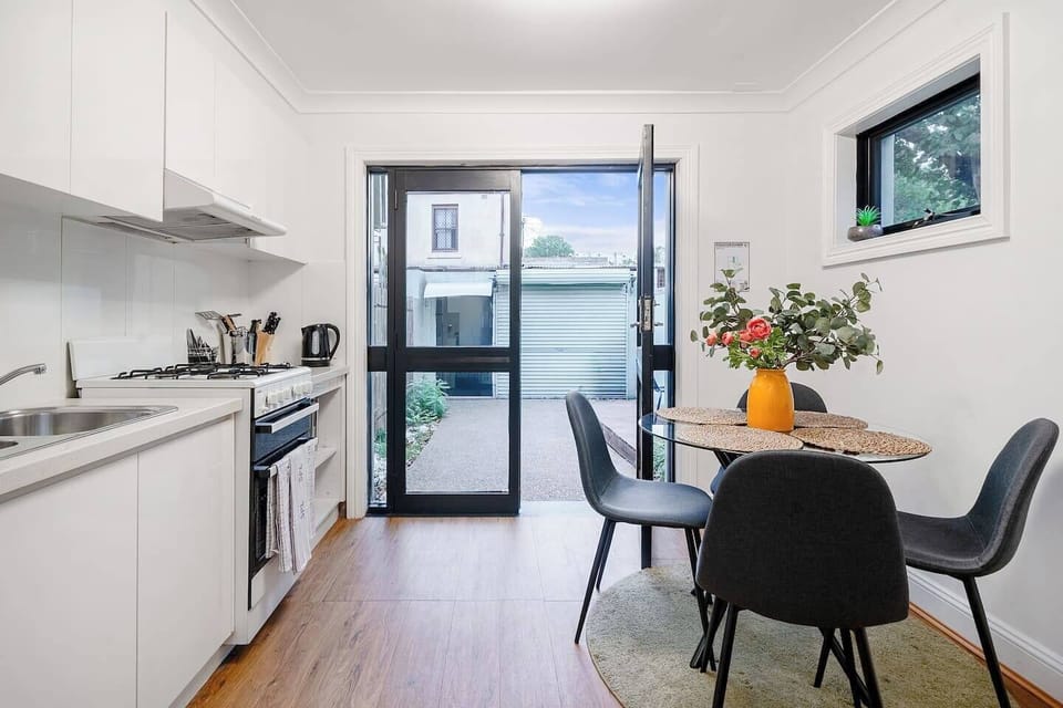 Share a meal around the round dining table, whether it’s a home-cooked feast or a tasty local takeaway.
