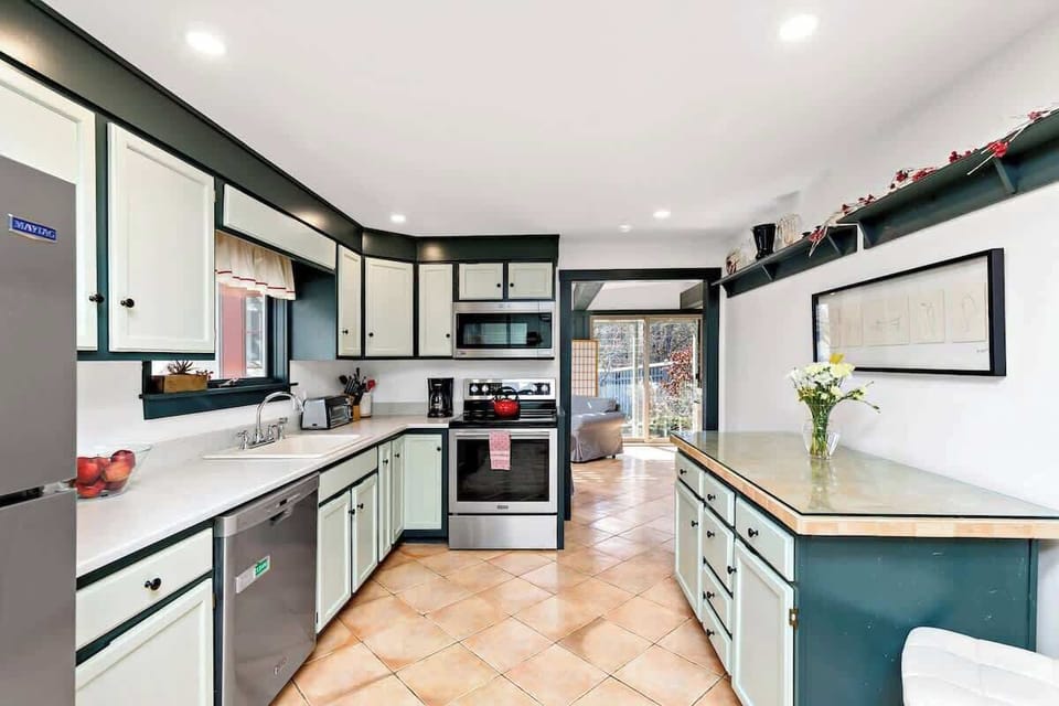 A fully stocked kitchen with stainless steel appliances