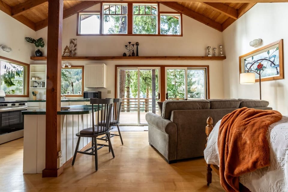 Open living space has amazing views and light