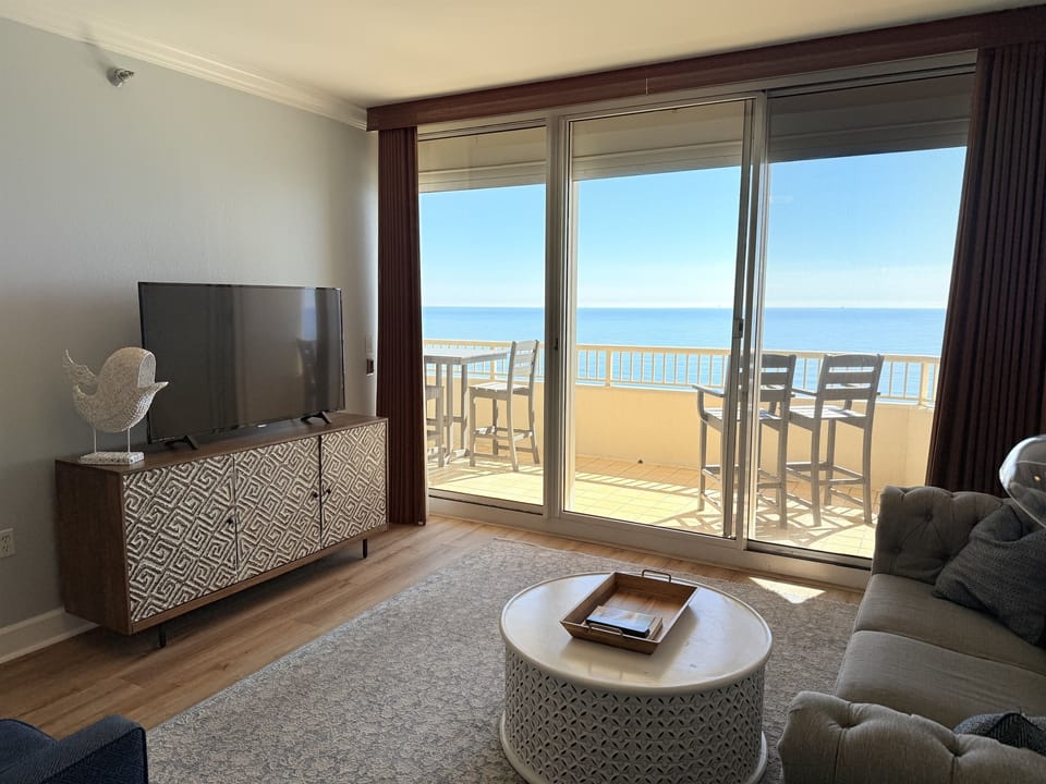 Tall chairs and tall table on balcony