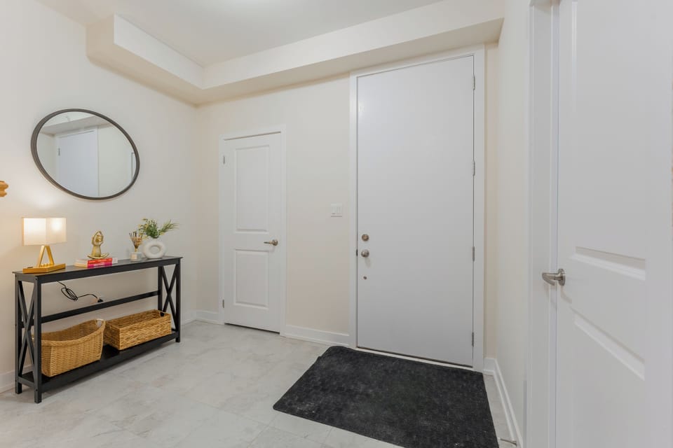 A bright and inviting home entrance with a touch of elegance.